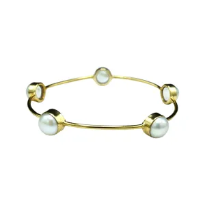 212-01-G | SEEMA 9 MM PEARL BEZEL BANGLE IN GOLD